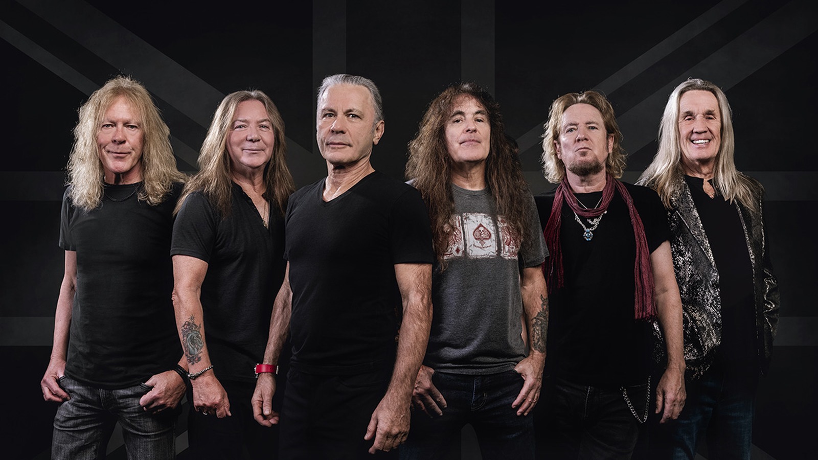 Bruce Dickinson with Iron Maiden in an official band photo