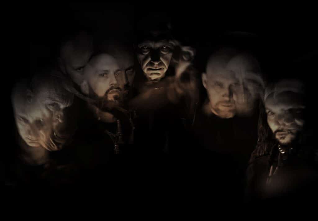 Mayhem band portrait featuring blurred, shadowy faces in dark black metal aesthetic